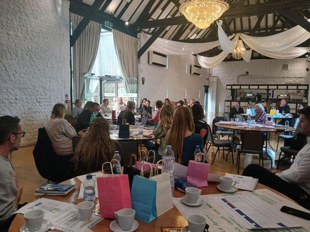 People sitting around table at CAPITAL drug and alcohol partnership event 1